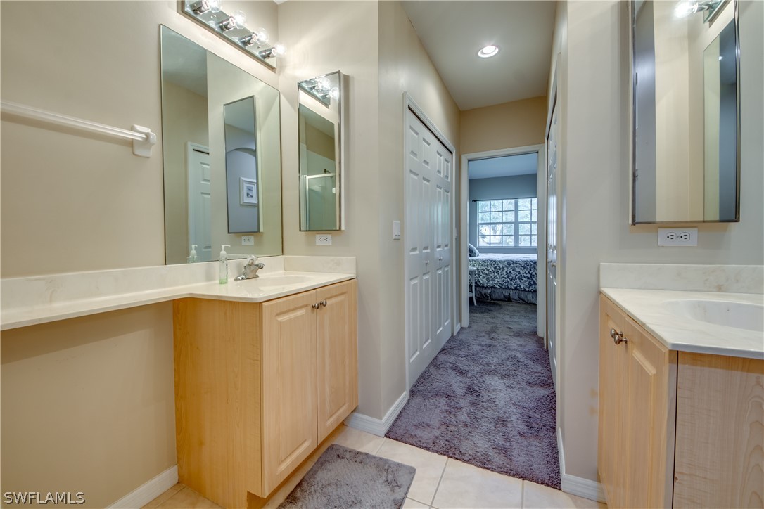 5180 Park Road, Unit 4 Fort Myers, FL 33908 - Photo 17 of 24 a bathroom with a sink a mirror and a bathtub