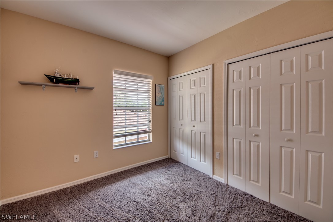 5180 Park Road, Unit 4 Fort Myers, FL 33908 - Photo 21 of 24 a view of an empty room with a window
