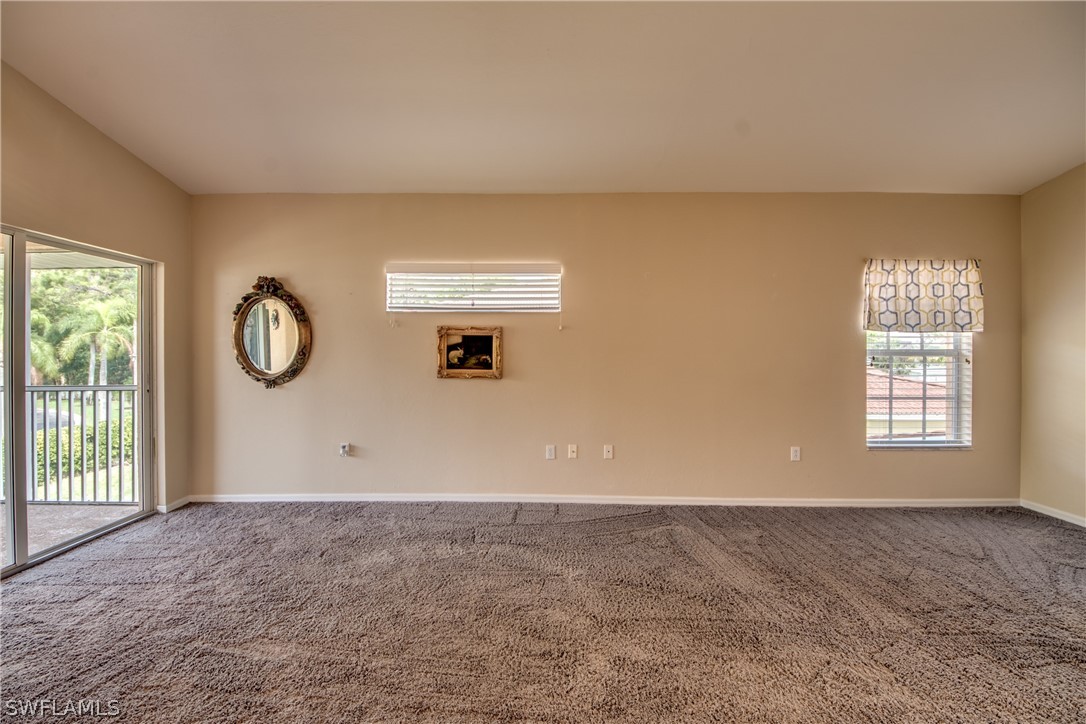 5180 Park Road, Unit 4 Fort Myers, FL 33908 - Photo 10 of 24 a view of an empty room with a window