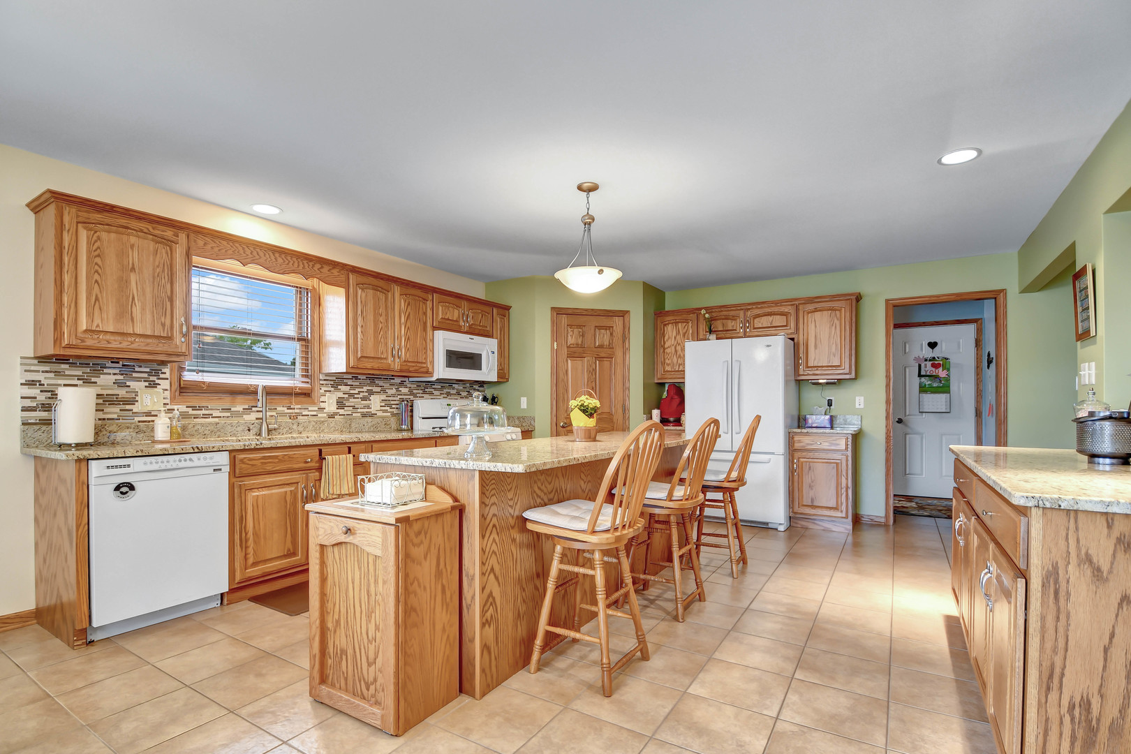 2012 Willow Brook Drive Bourbonnais, IL 60914 - Photo 12 of 33 a large kitchen with lots of counter space and appliances