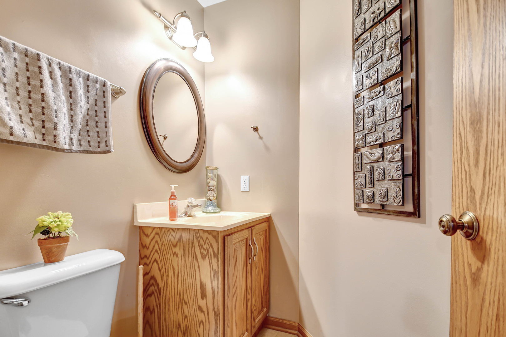 2012 Willow Brook Drive Bourbonnais, IL 60914 - Photo 17 of 33 a bathroom with a sink a toilet and a mirror