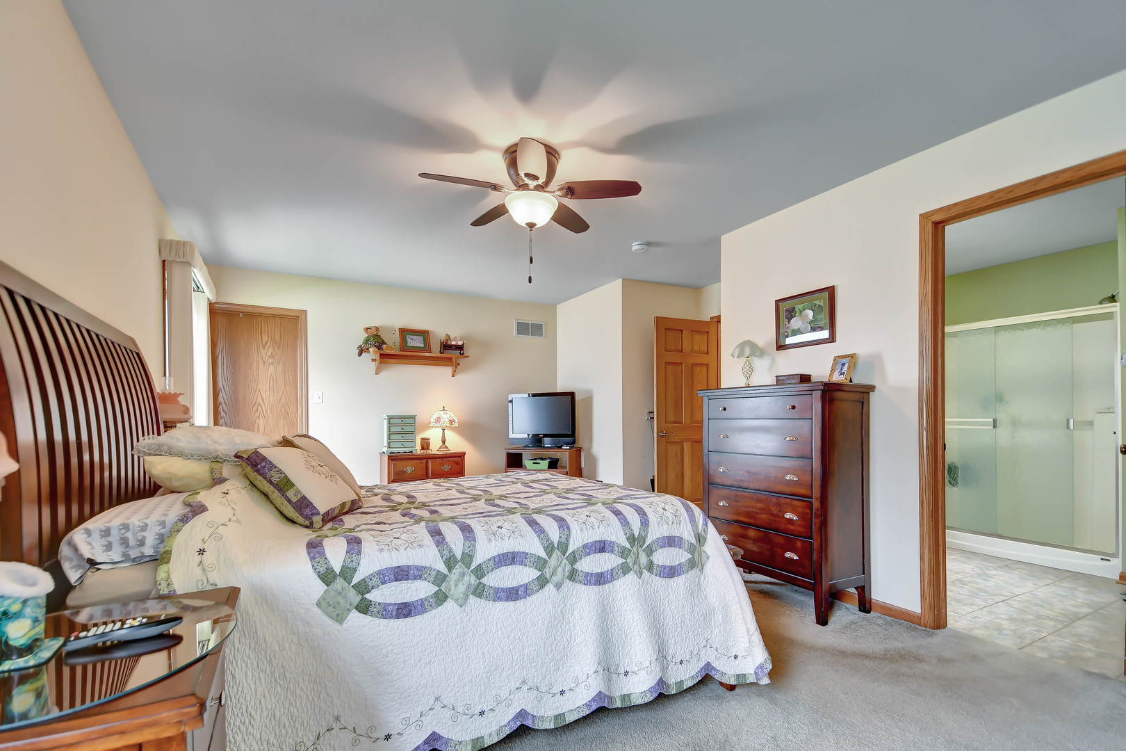 2012 Willow Brook Drive Bourbonnais, IL 60914 - Photo 20 of 33 a bedroom with furniture and a chandelier