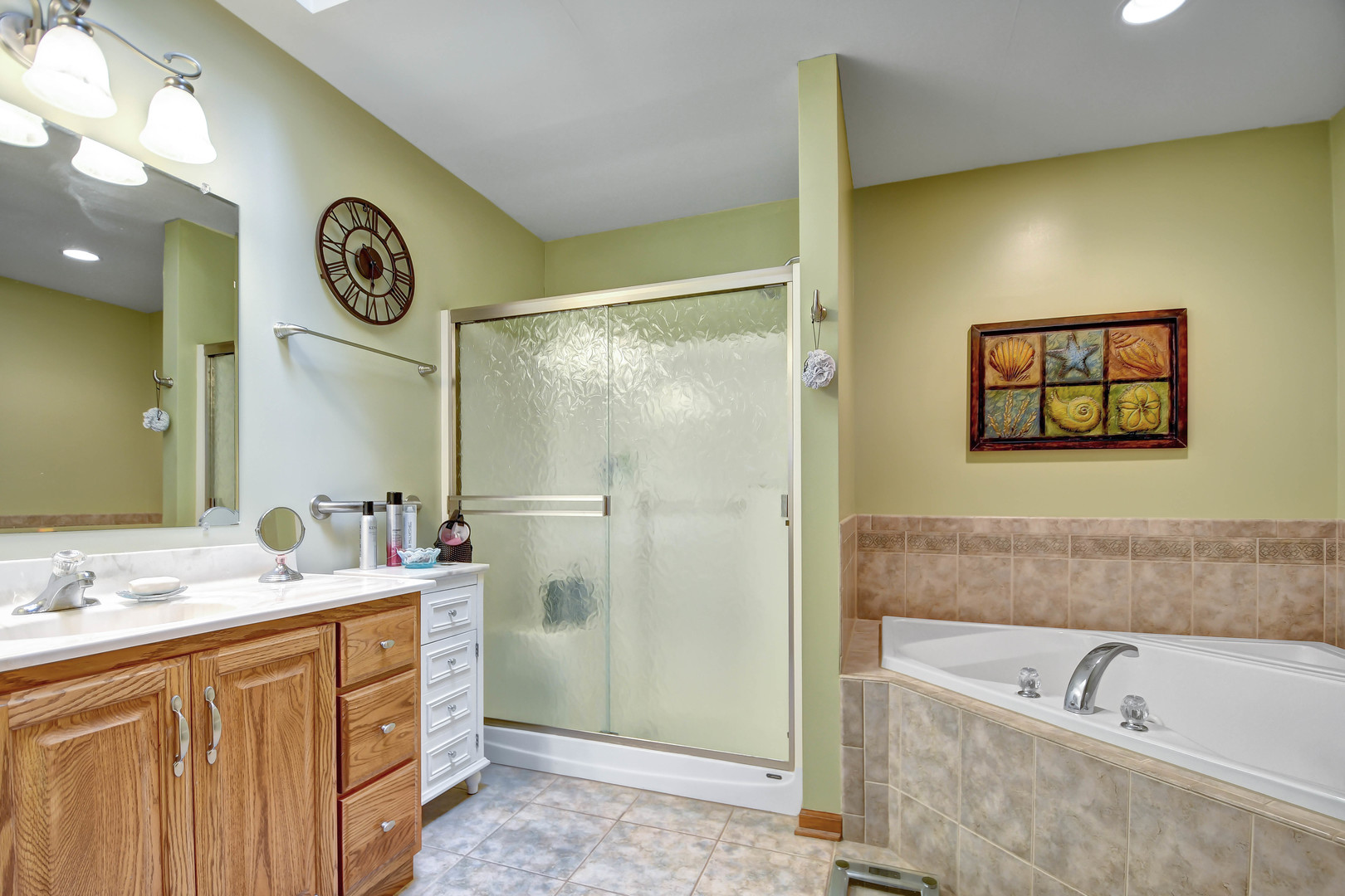 2012 Willow Brook Drive Bourbonnais, IL 60914 - Photo 21 of 33 a bathroom with a double vanity sink mirror and bathtub