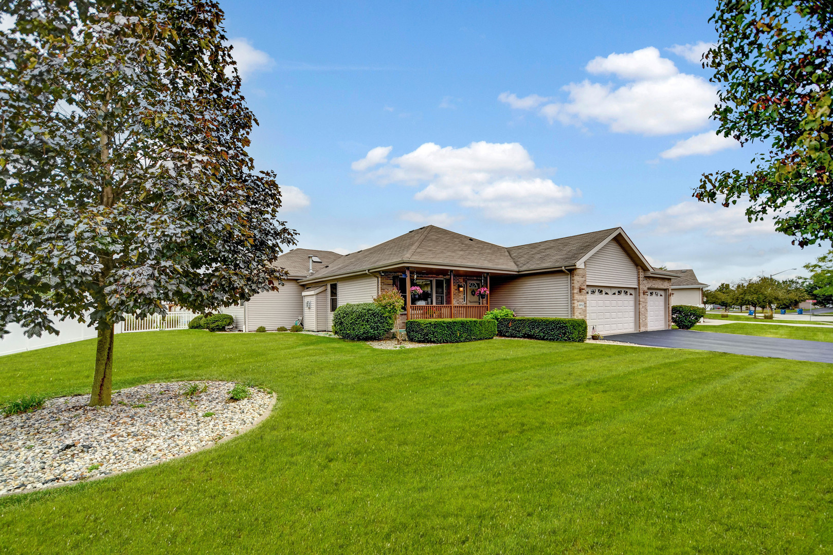 2012 Willow Brook Drive Bourbonnais, IL 60914 - Photo 27 of 33 a view of a big house with a big yard and large trees