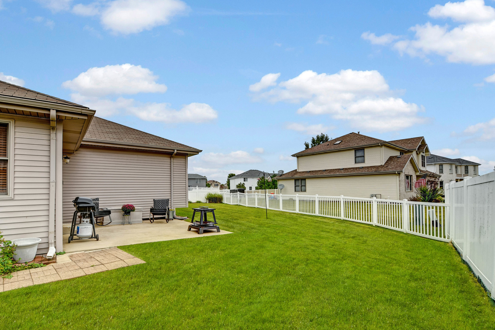 2012 Willow Brook Drive Bourbonnais, IL 60914 - Photo 30 of 33 a view of an house with backyard space and porch