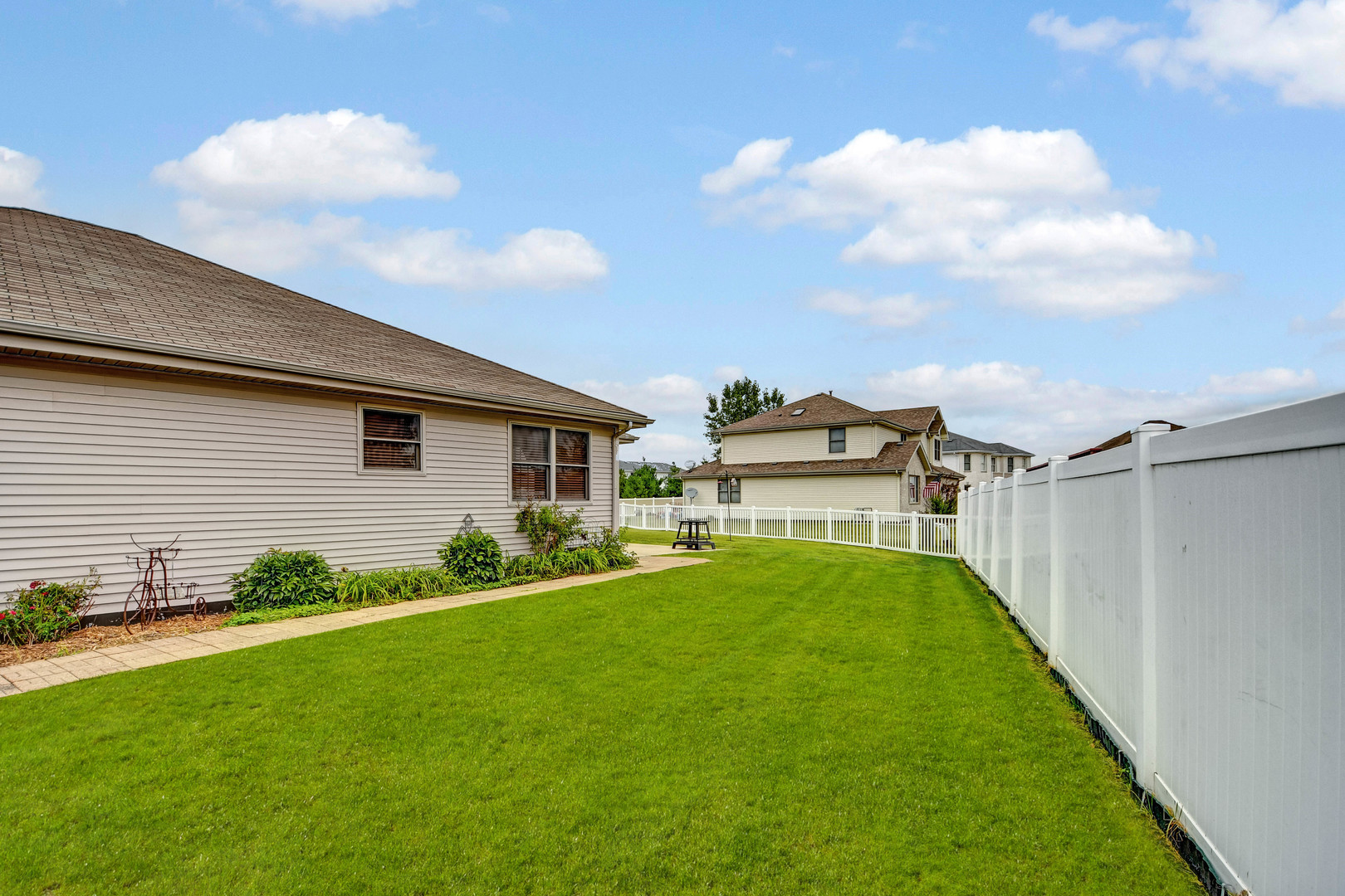 2012 Willow Brook Drive Bourbonnais, IL 60914 - Photo 31 of 33 a view of a house with a backyard