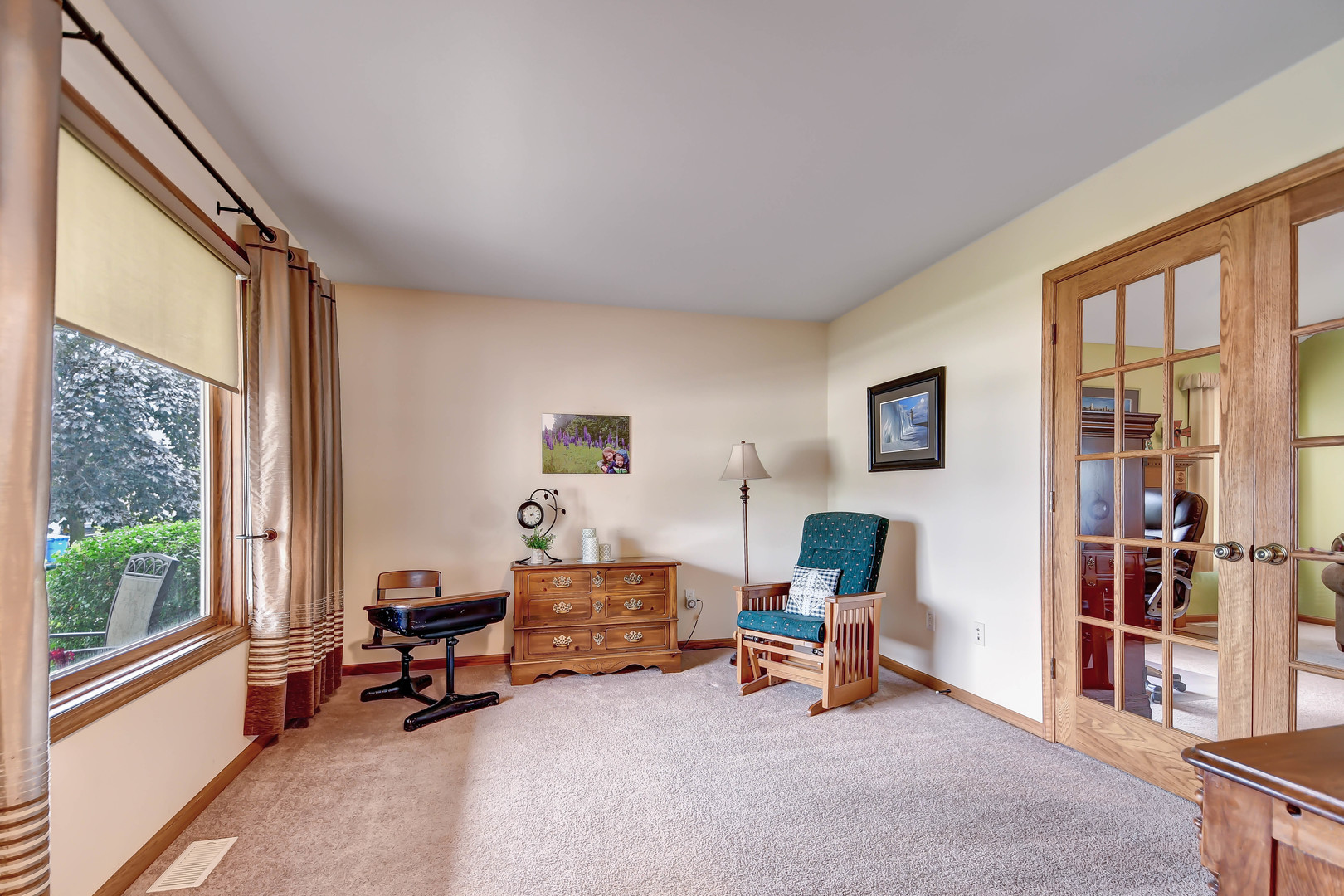 2012 Willow Brook Drive Bourbonnais, IL 60914 - Photo 4 of 33 a living room with furniture and a floor to ceiling window