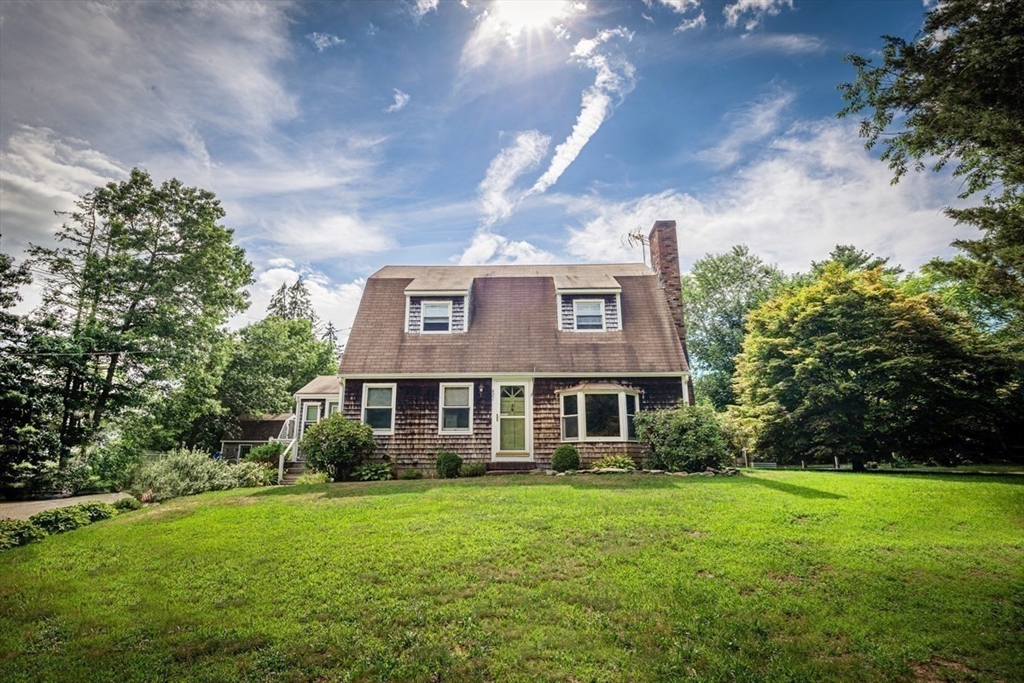421 County Road Rochester, MA 02576 - Photo 3 of 42 a front view of a house with a yard