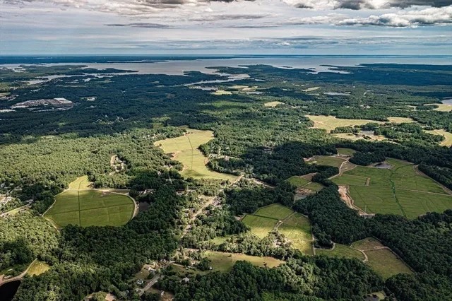 a view of a lake with a yard