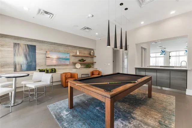 a view of a livingroom with furniture