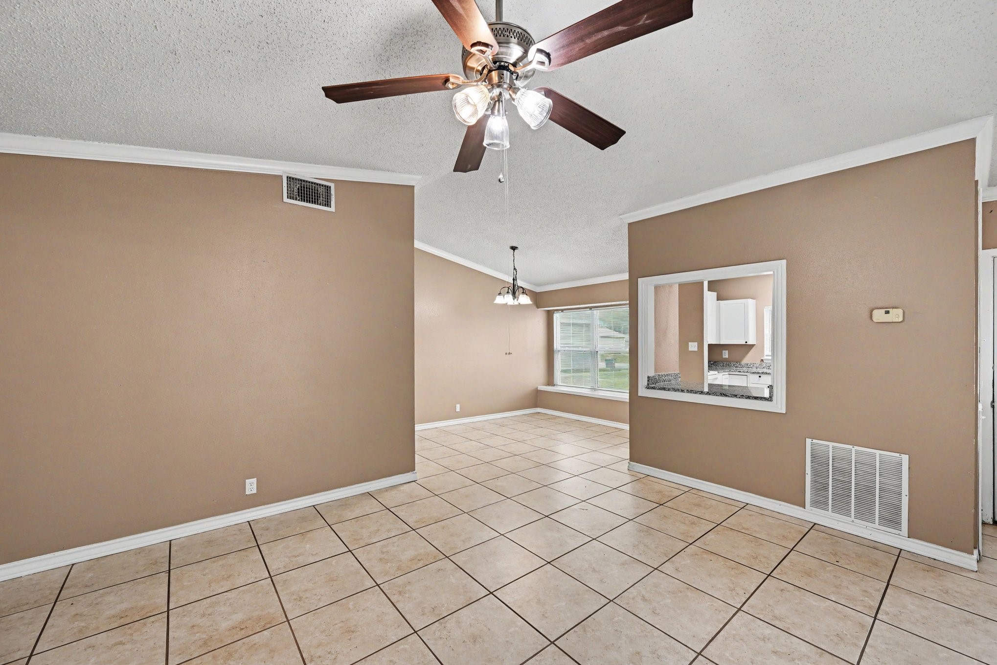 8406 Forest Ridge Drive San Antonio, TX 78239 - Photo 9 of 33 a view of an empty room with a window