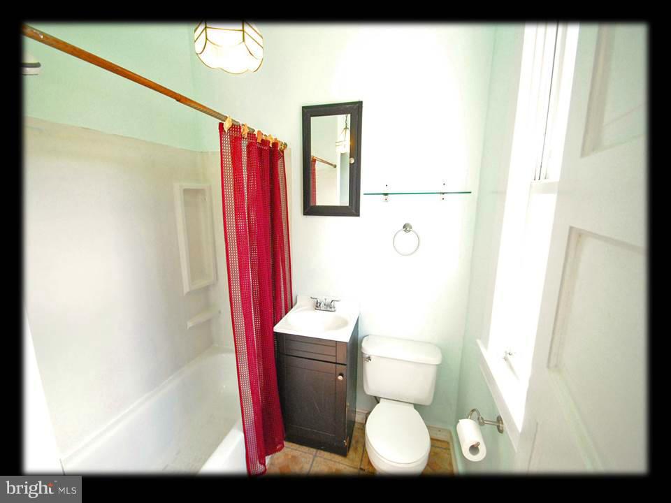 703 Mace Avenue Baltimore, MD 21221 - Photo 11 of 15 UPDATED FULL BATH