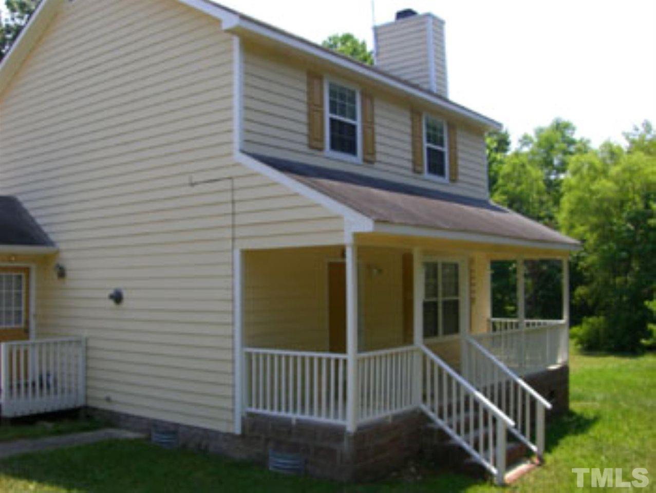 6311 Battleford Drive Raleigh, NC 27612 - Photo 1 of 6 a view of a house with a yard and deck