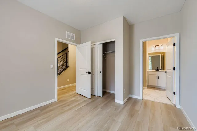 a view of entryway with wooden floor