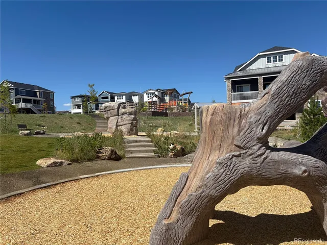 a view of ocean with large trees