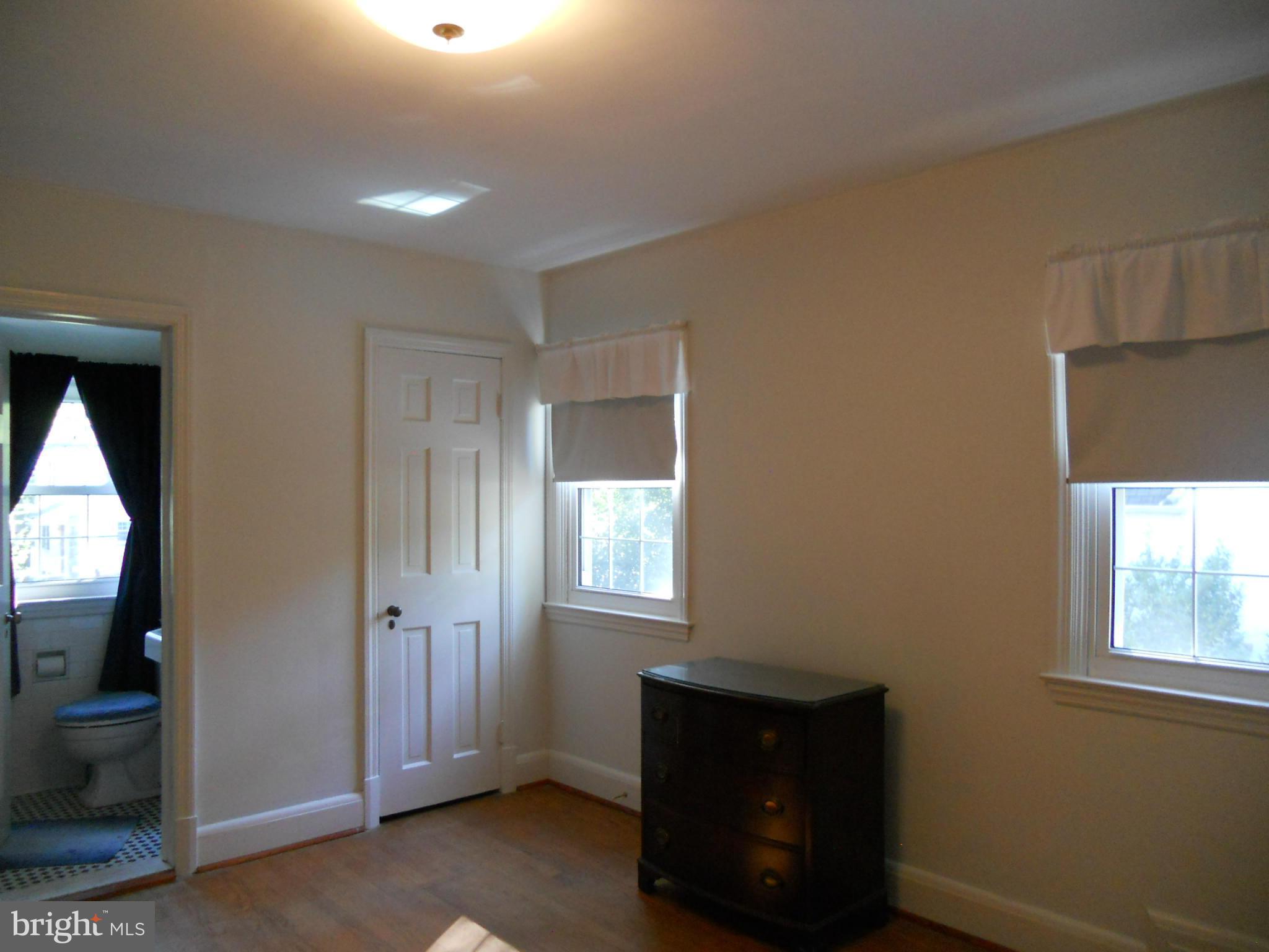 919 Kingston Road Baltimore, MD 21212 - Photo 14 of 17 Bedroom with en suite bath with shower