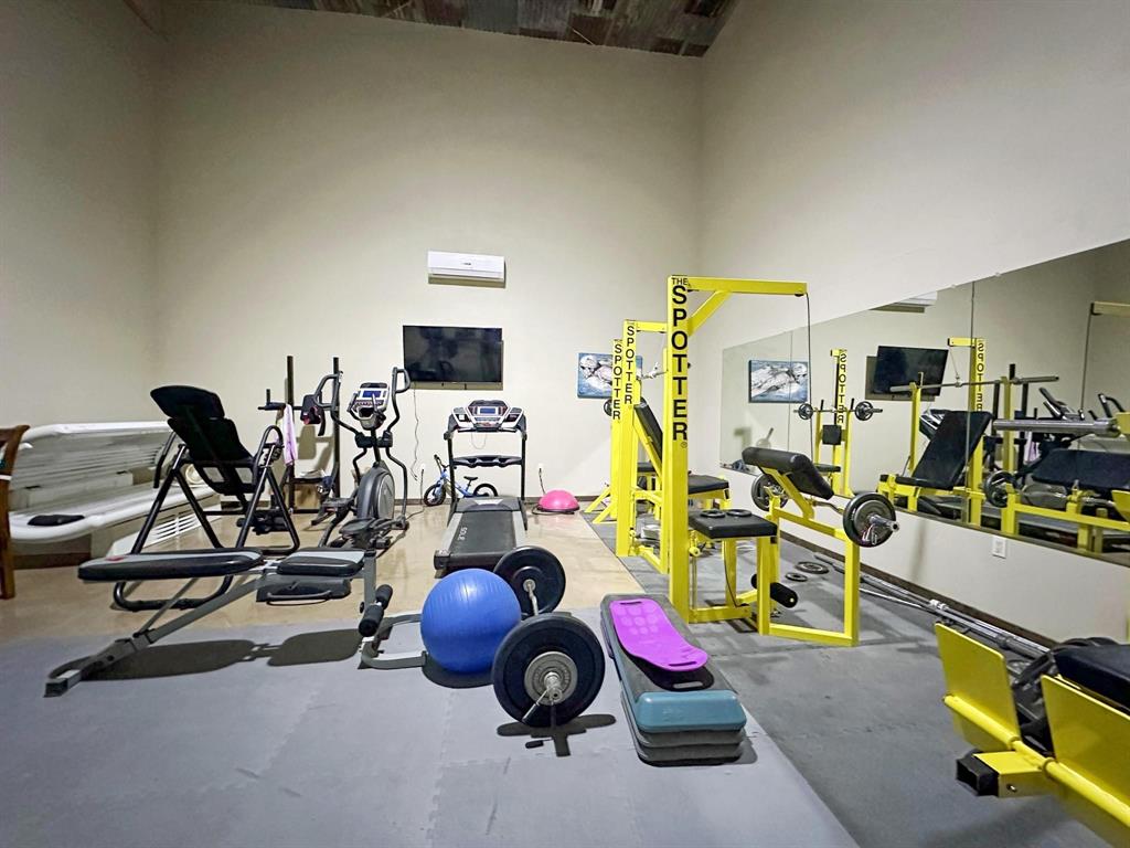 1990 Jim Harry Loop Sunset, TX 76270 - Photo 24 of 39 a view of a room with gym equipment