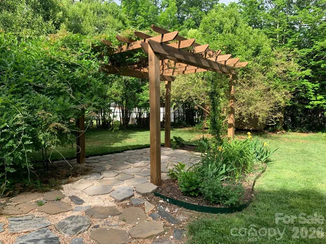 a view of a park with a tree