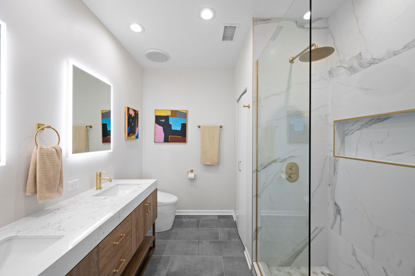 17 North Loomis Street, Unit 4D Chicago, IL 60607 - Photo 12 of 26 a bathroom with a double vanity sink mirror and shower