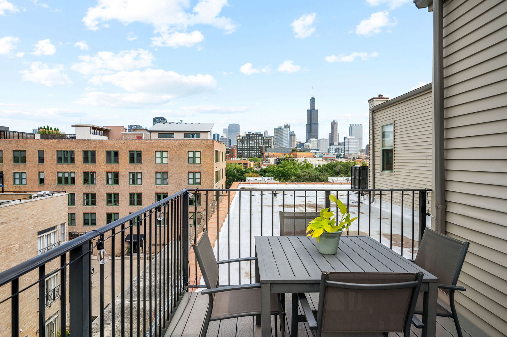 17 North Loomis Street, Unit 4D Chicago, IL 60607 - Photo 21 of 26 a view of a balcony with city view