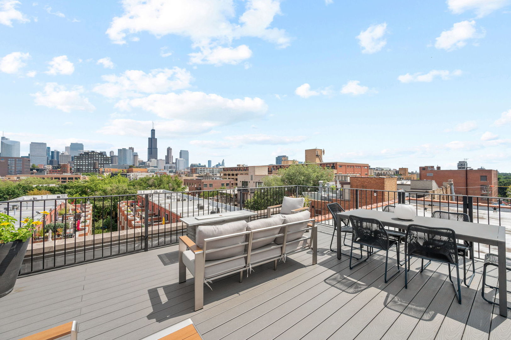 17 North Loomis Street, Unit 4D Chicago, IL 60607 - Photo 22 of 26 a view of a terrace with wooden benches