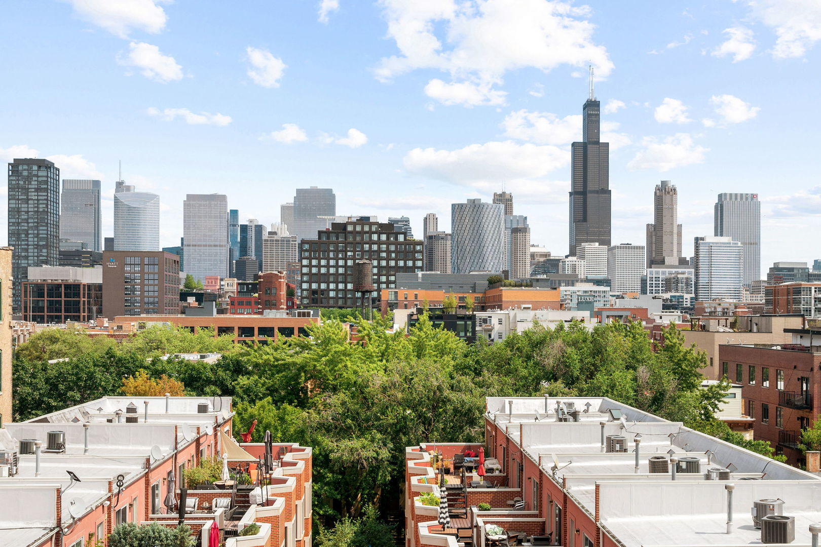 17 North Loomis Street, Unit 4D Chicago, IL 60607 - Photo 23 of 26 a view of a city with tall buildings