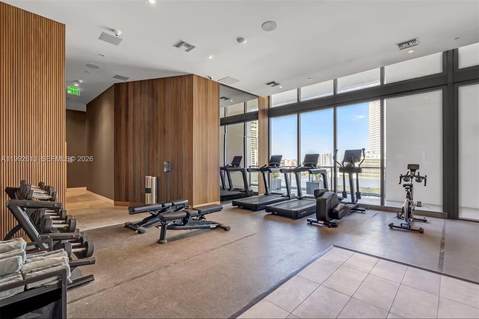 229 Southwest 9th Street, Unit 202 Miami, FL 33130 - Photo 21 of 35 a view of a room with gym equipment