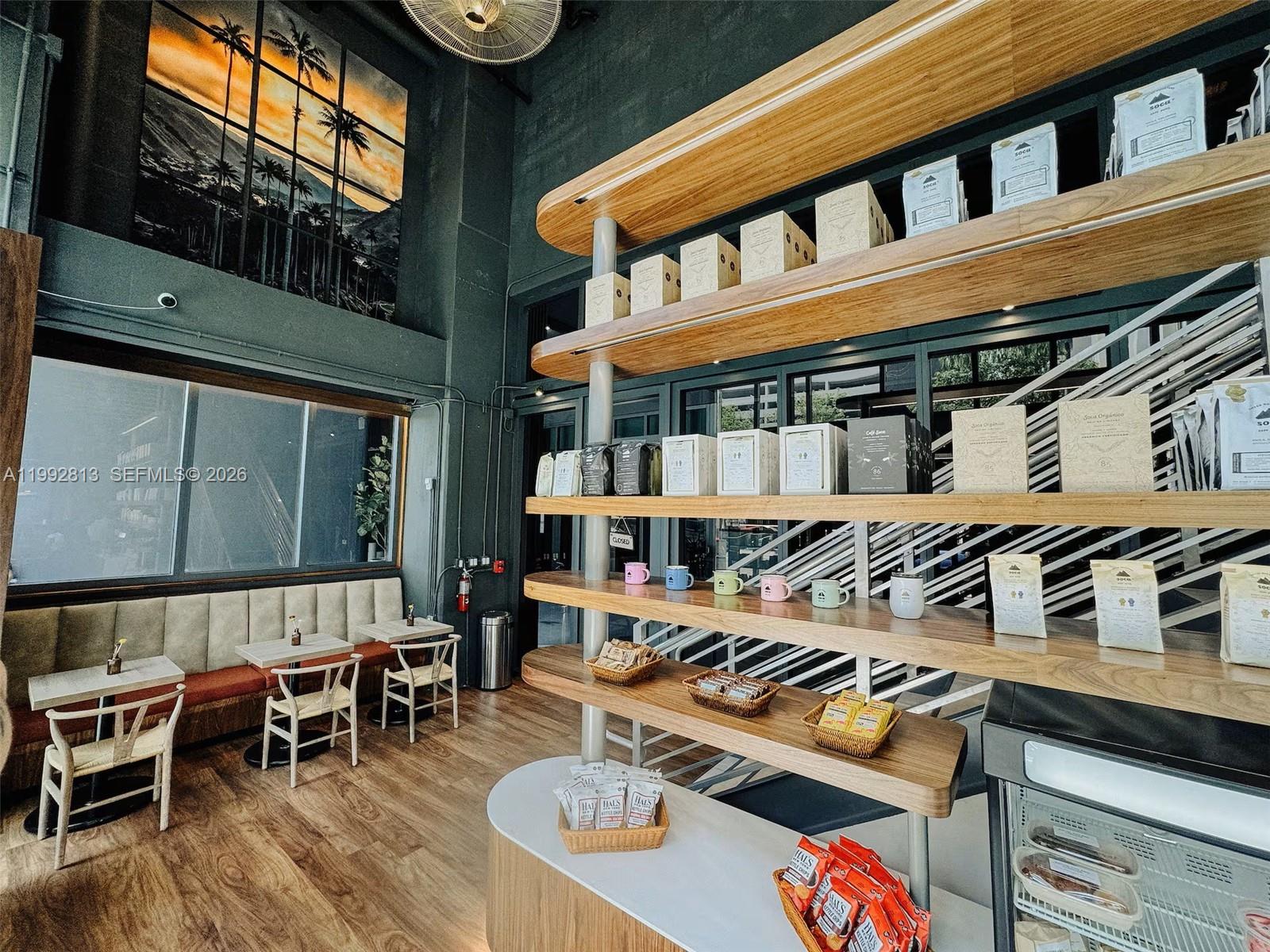 229 Southwest 9th Street, Unit 202 Miami, FL 33130 - Photo 25 of 35 a view of a chairs and table in a patio