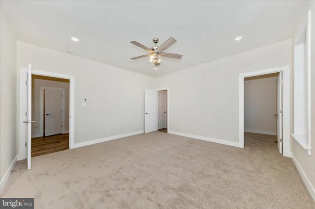 a view of storage and utility room with washer and dryer