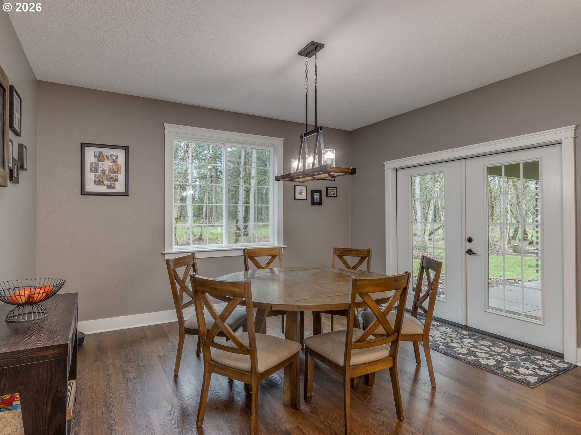12950 South Barnards Road Molalla, OR 97038 - Photo 18 of 48 a view of a dining room with furniture window and wooden floor