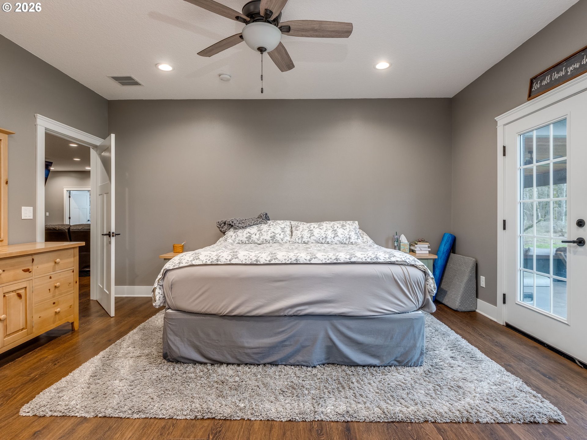 12950 South Barnards Road Molalla, OR 97038 - Photo 23 of 48 a bed sitting in a room next to a window