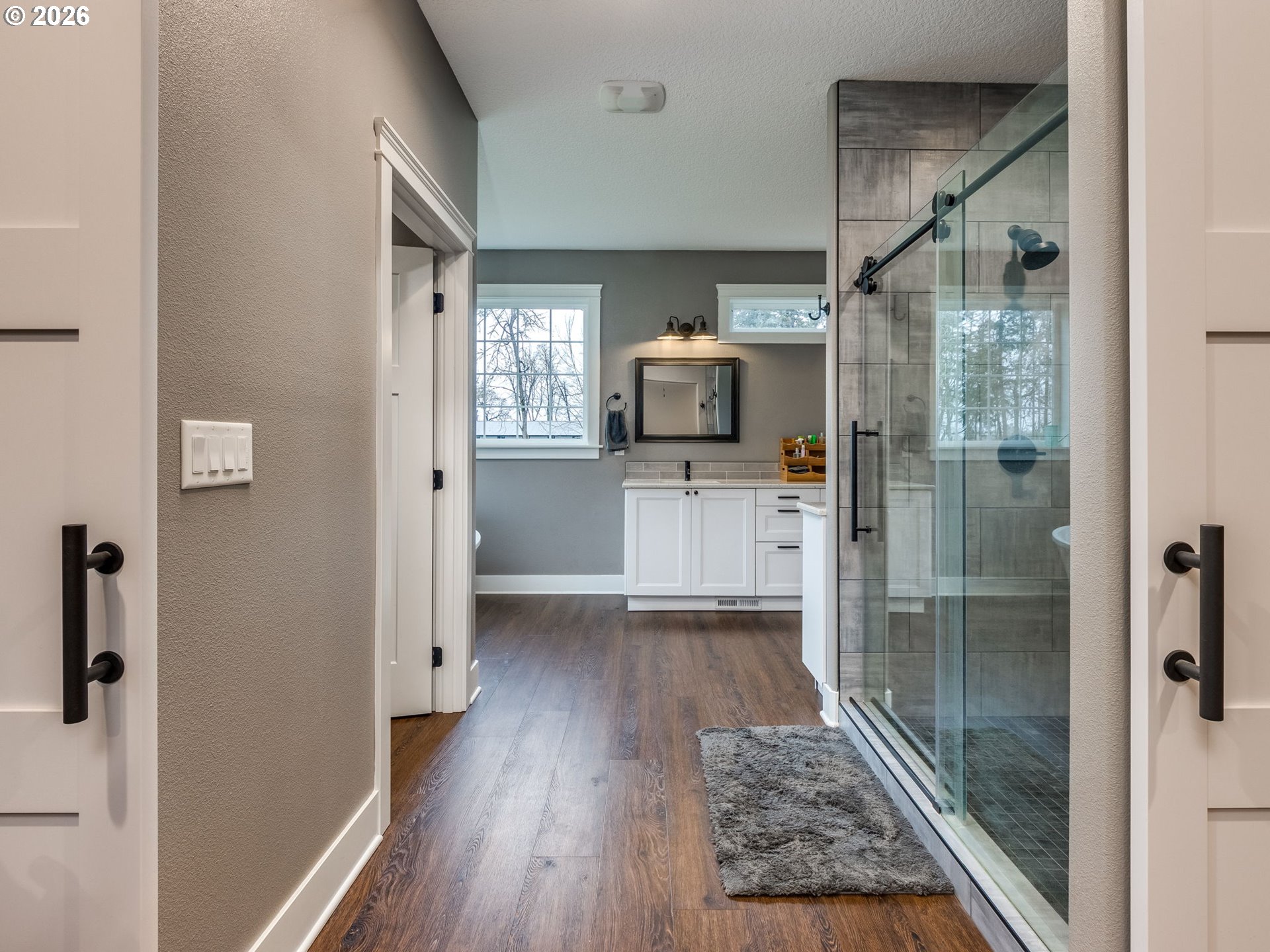12950 South Barnards Road Molalla, OR 97038 - Photo 25 of 48 a open kitchen with white cabinets and stainless steel appliances