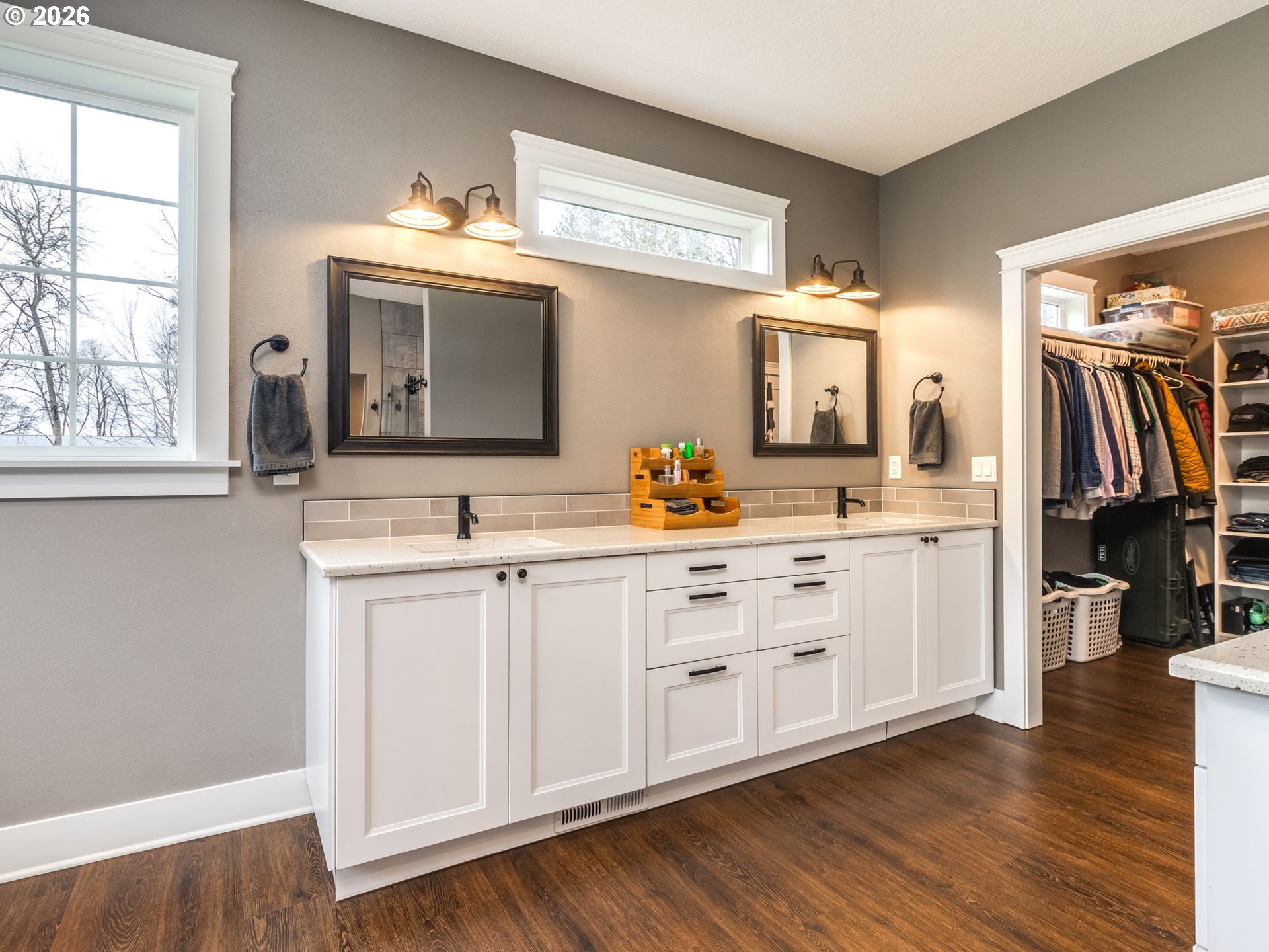 12950 South Barnards Road Molalla, OR 97038 - Photo 27 of 48 a spacious bathroom with a double vanity sink a mirror and a window