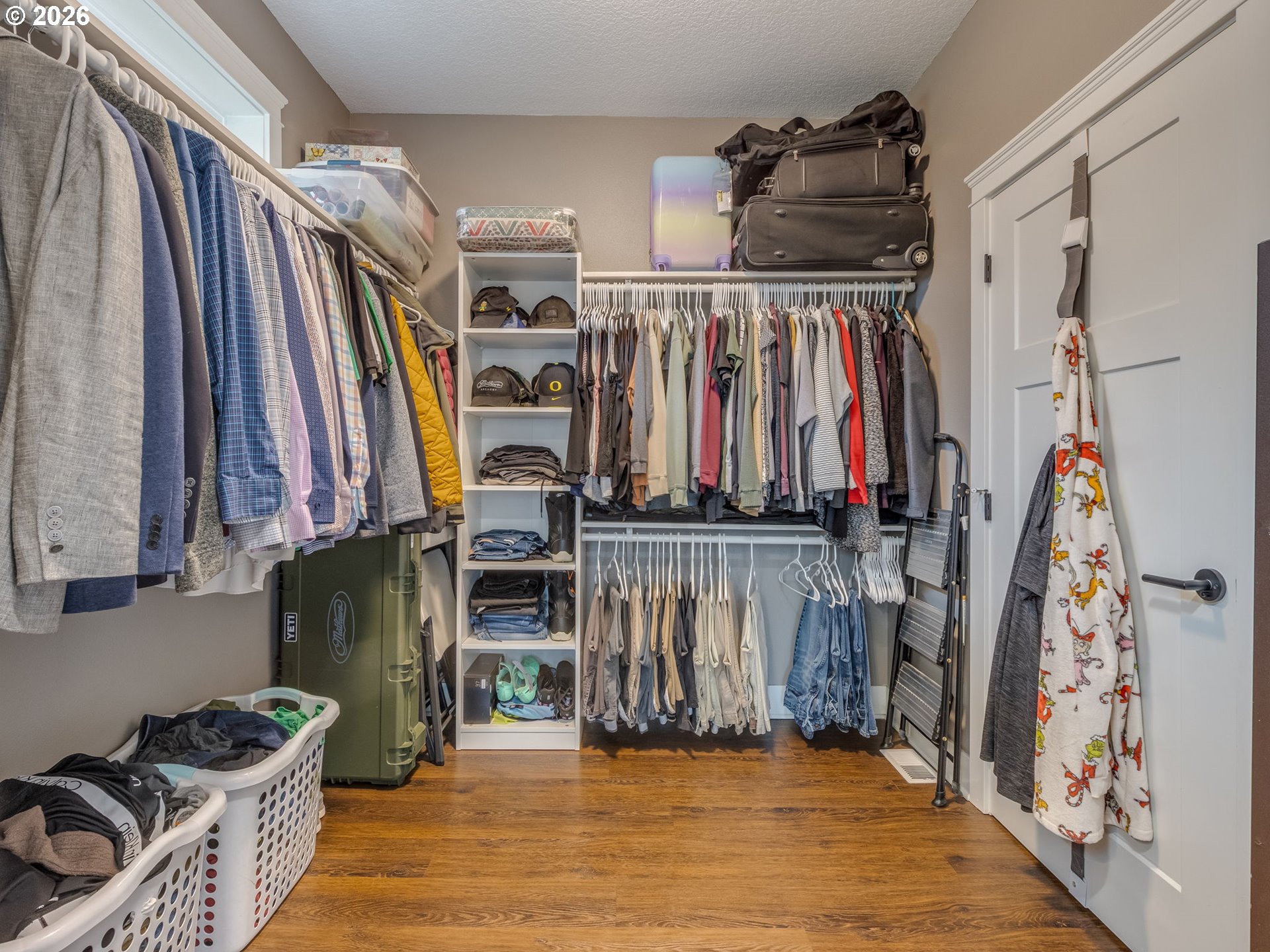 12950 South Barnards Road Molalla, OR 97038 - Photo 30 of 48 a view of walk in closet with clothes
