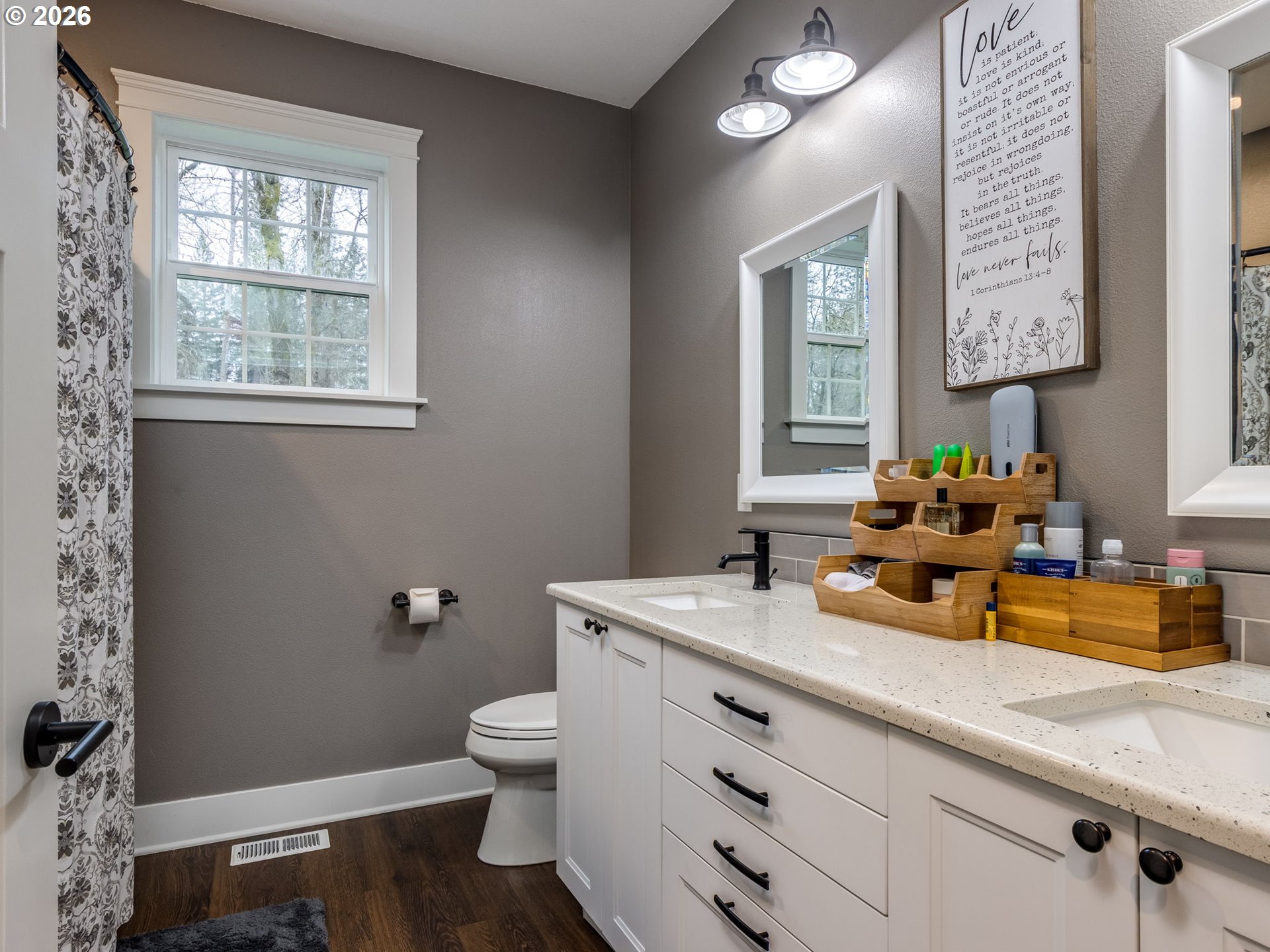12950 South Barnards Road Molalla, OR 97038 - Photo 31 of 48 a bath room with a toilet a sink and a mirror