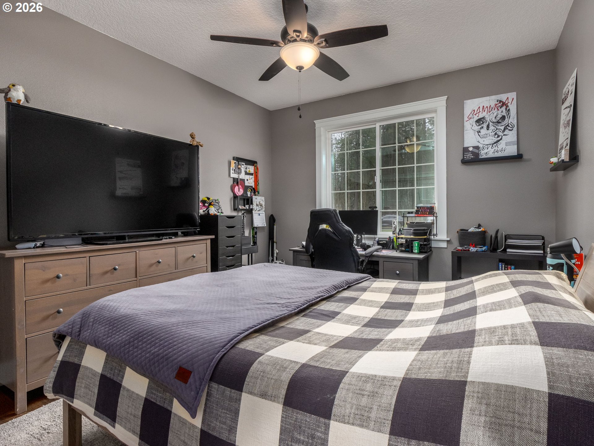 12950 South Barnards Road Molalla, OR 97038 - Photo 37 of 48 a bedroom with a bed and a flat screen tv