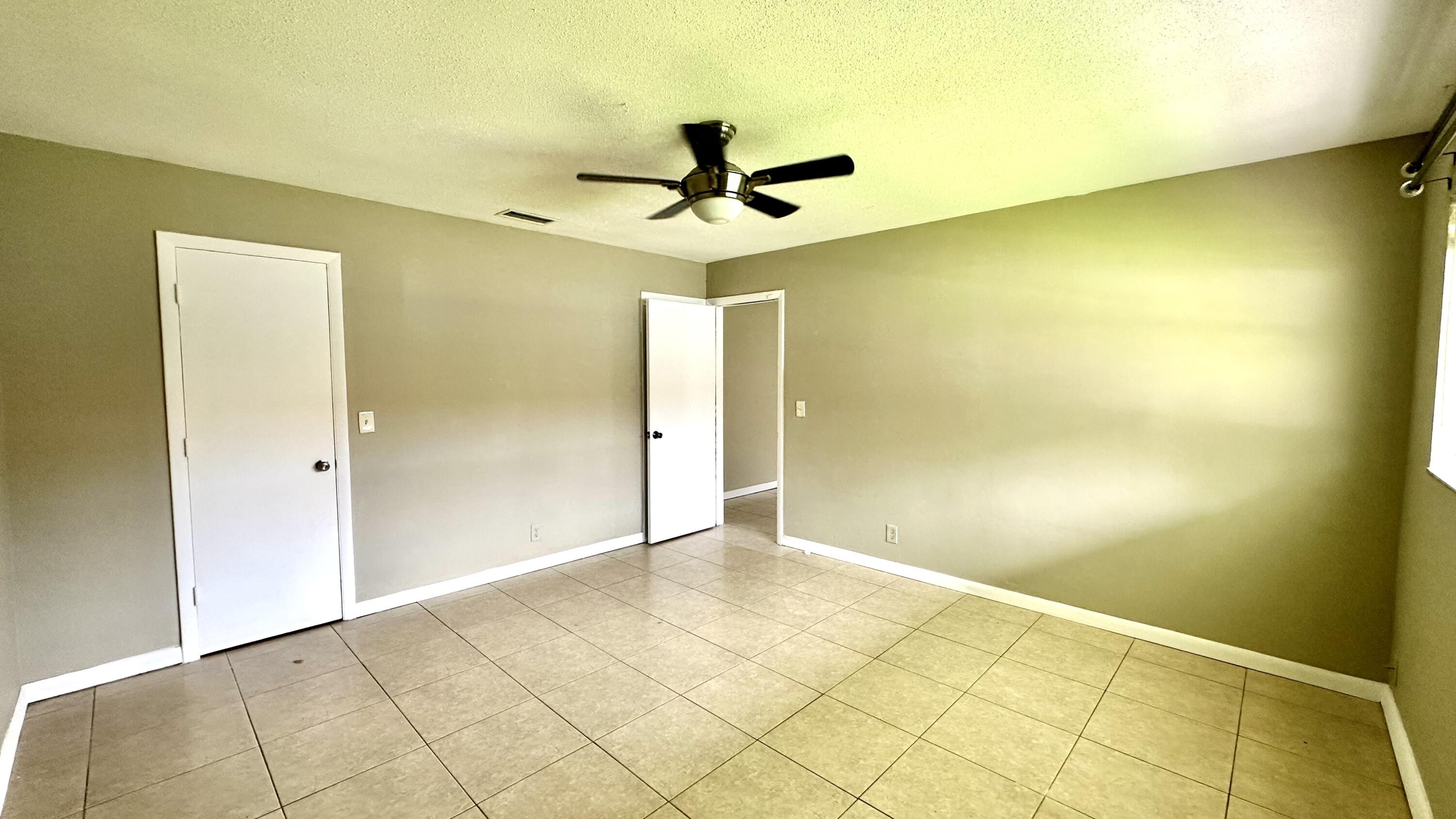 5745 Buchanan Street Hollywood, FL 33021 - Photo 18 of 20 a view of a big room with windows