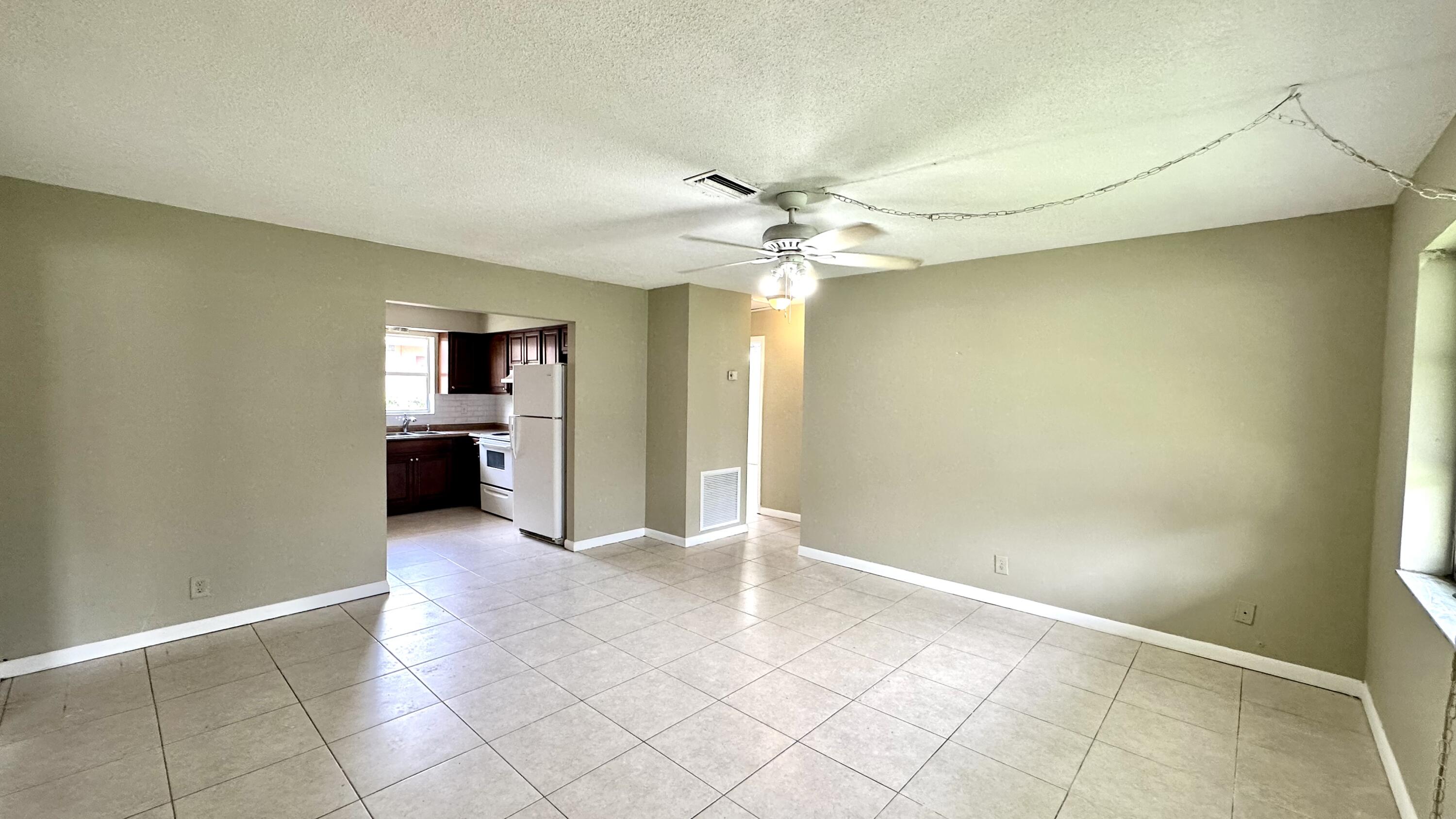 5745 Buchanan Street Hollywood, FL 33021 - Photo 2 of 20 a view of a kitchen with a sink and a kitchen