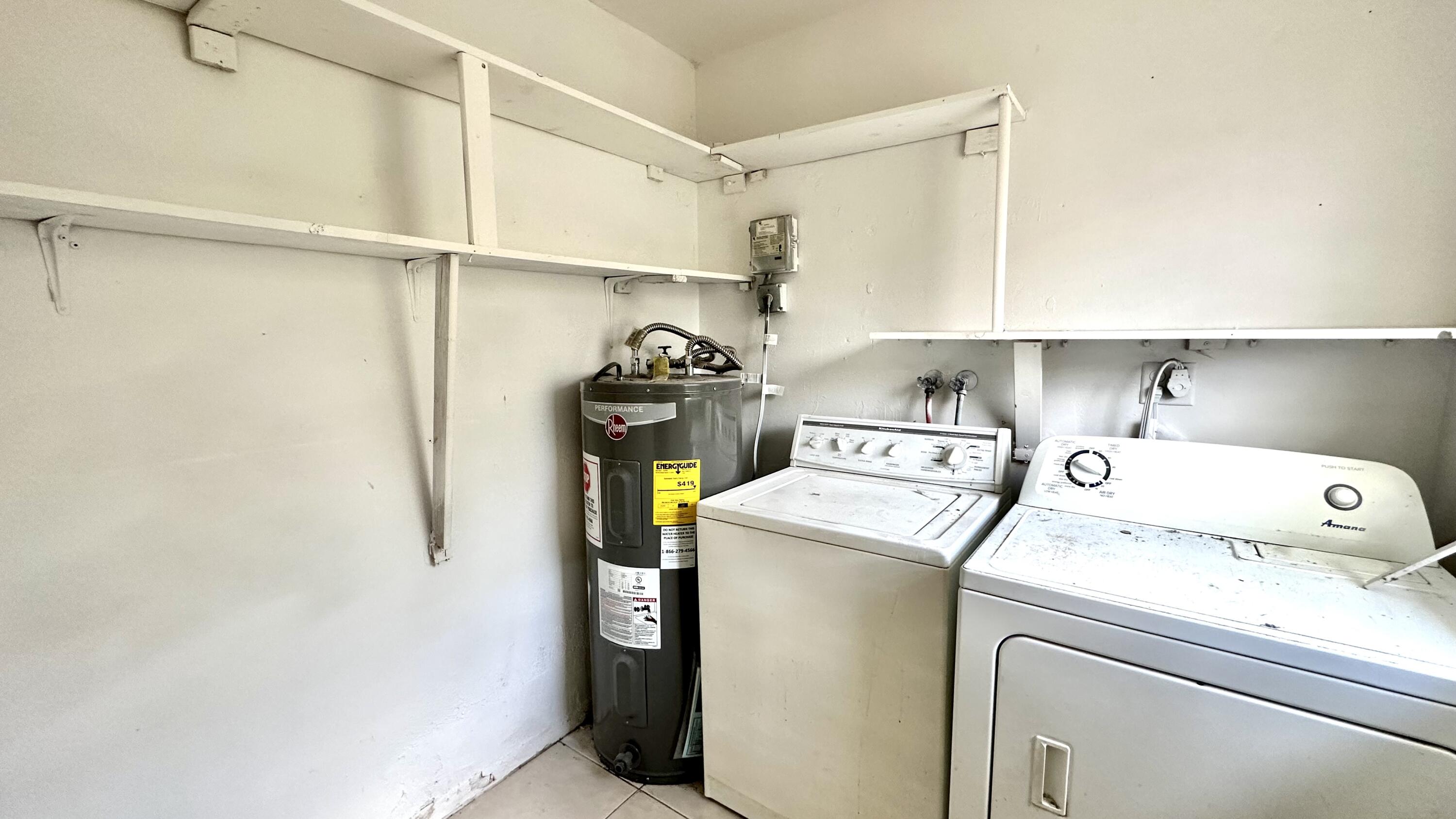 5745 Buchanan Street Hollywood, FL 33021 - Photo 4 of 20 a utility room with dryer and washer