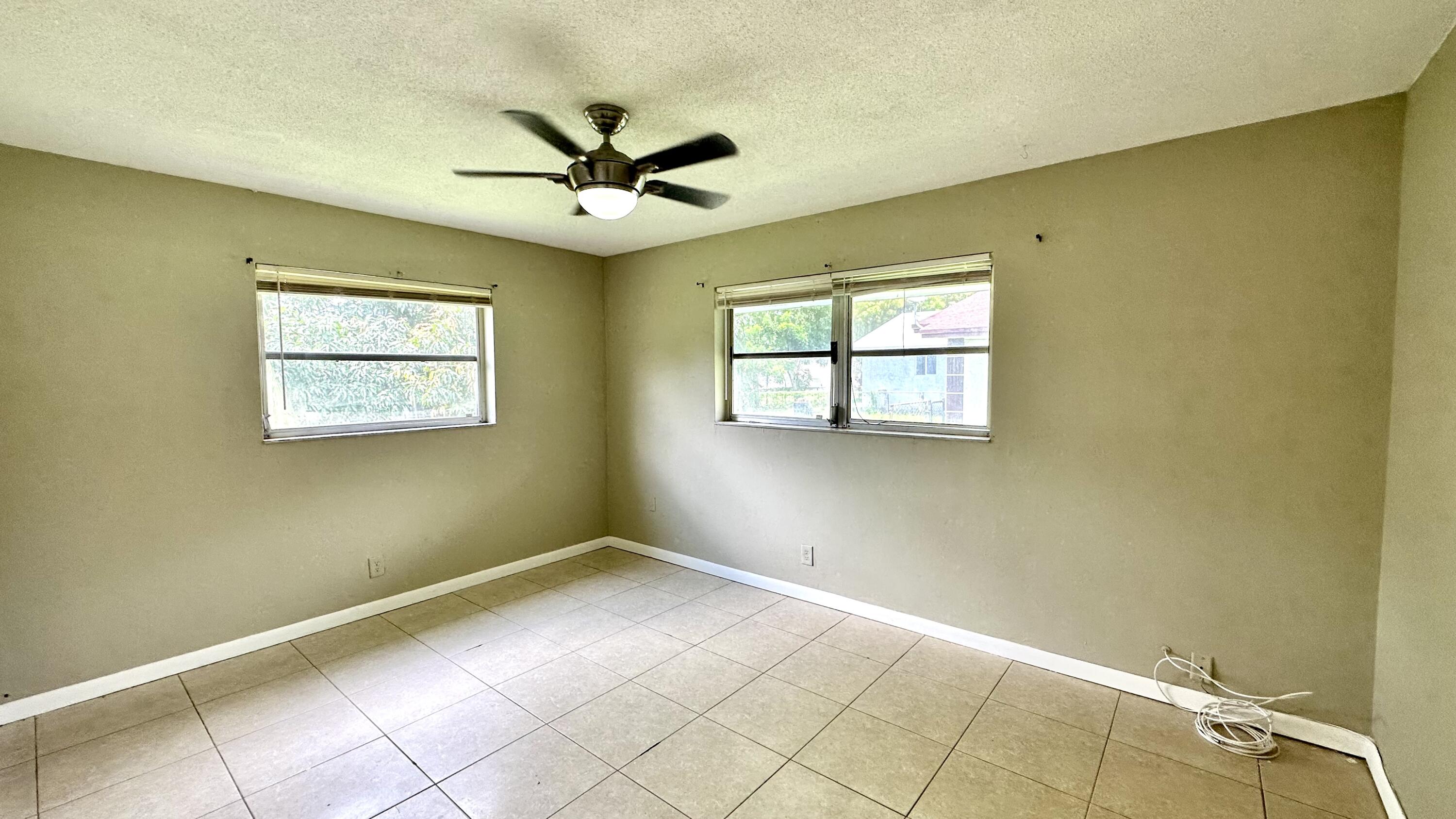 5745 Buchanan Street Hollywood, FL 33021 - Photo 8 of 20 a view of a big room with windows