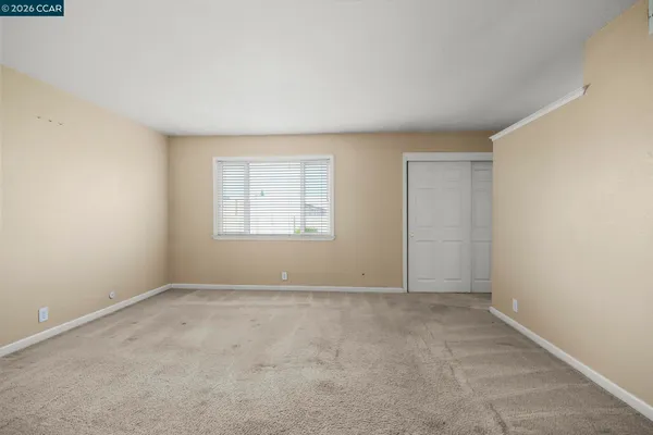 an empty room with windows