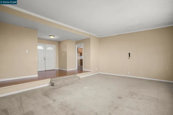an empty room with an entryway