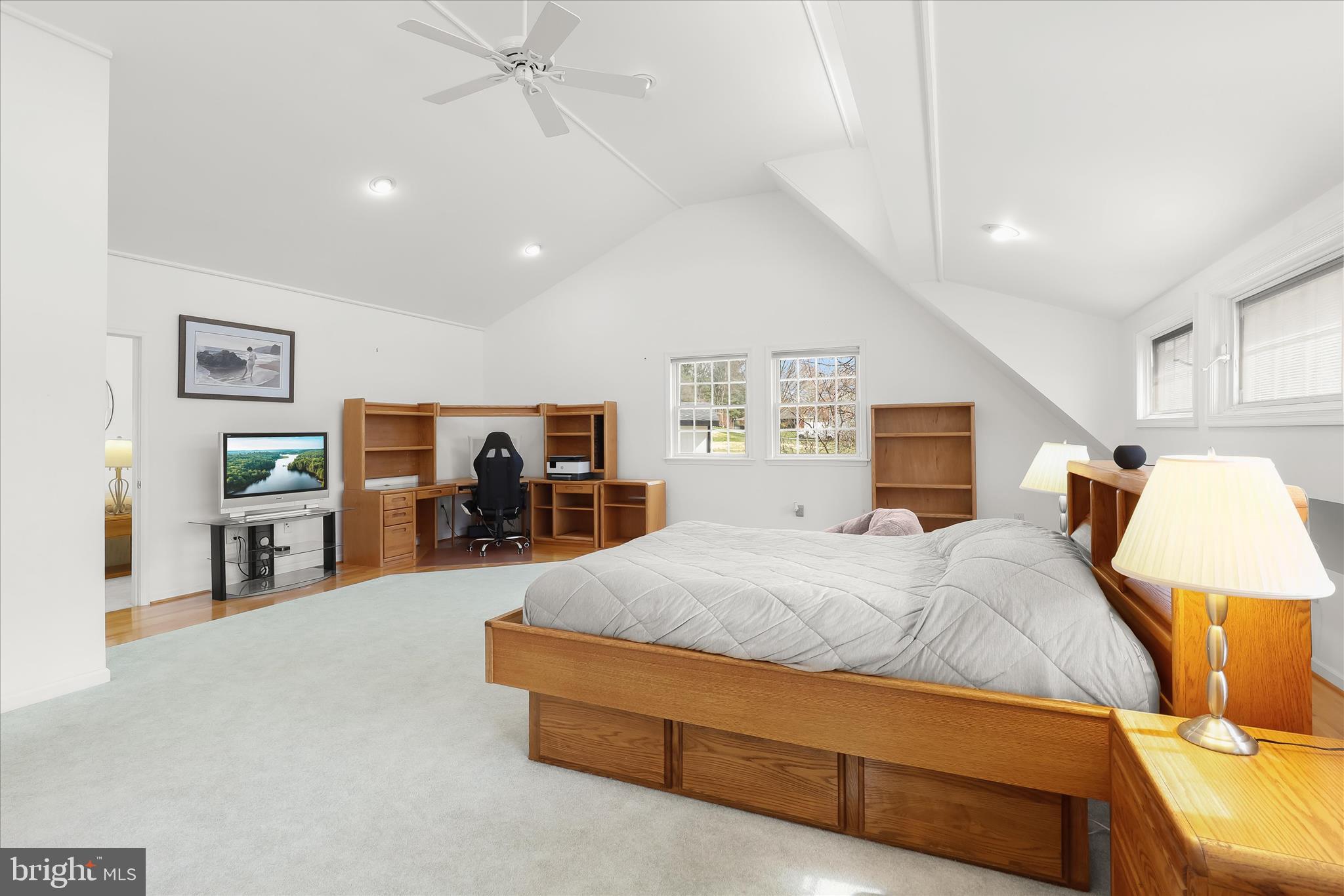13612 Jacobs Road Mount Airy, MD 21771 - Photo 53 of 90 a spacious bedroom with a bed and a flat tv screen on dresser