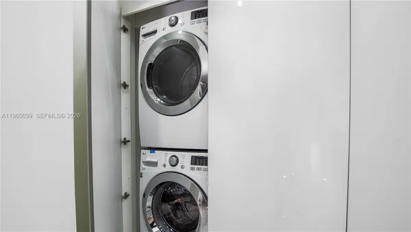a view of a balcony with chair and table