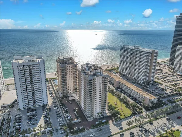 a view of a city with tall buildings