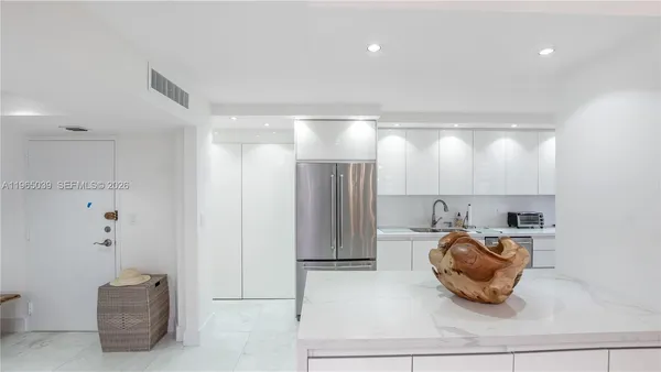 a room with furniture and a mirror