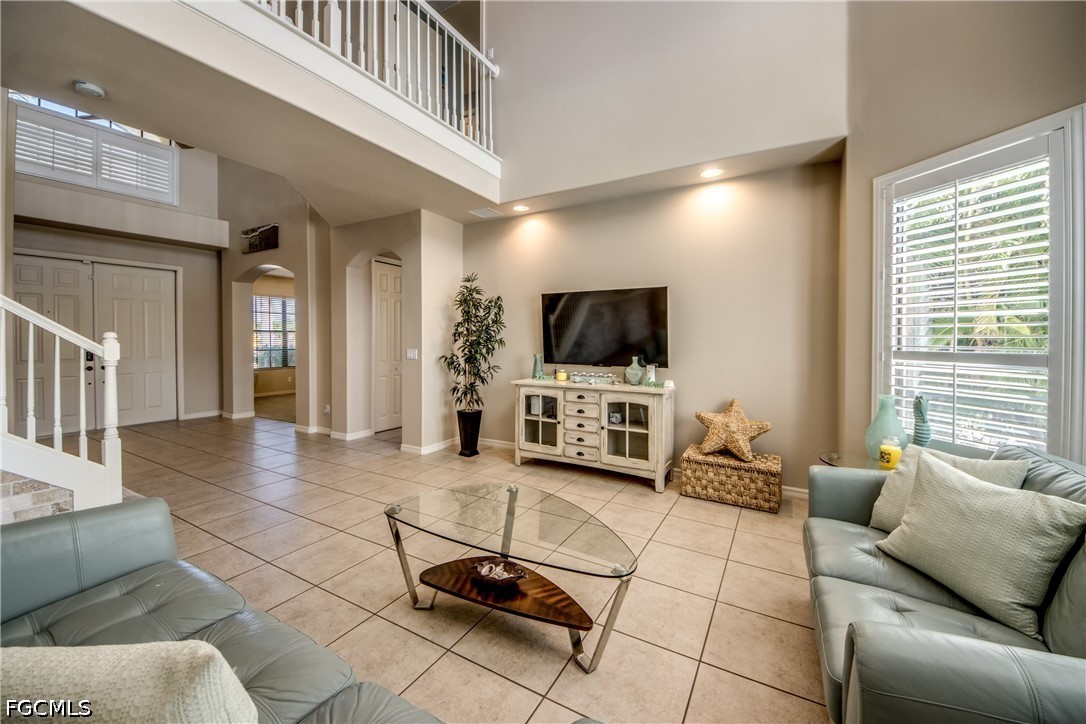 5601 Del Rio Court Cape Coral, FL 33904 - Photo 13 of 50 a living room with furniture and a flat screen tv