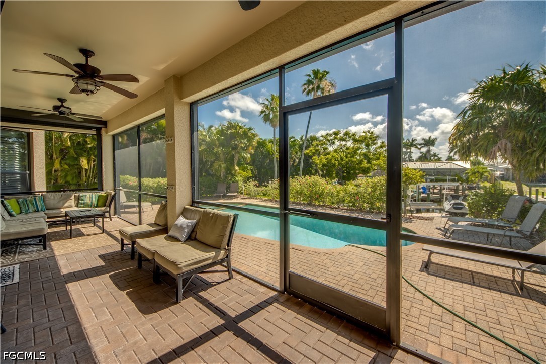 5601 Del Rio Court Cape Coral, FL 33904 - Photo 41 of 50 a living room with large windows