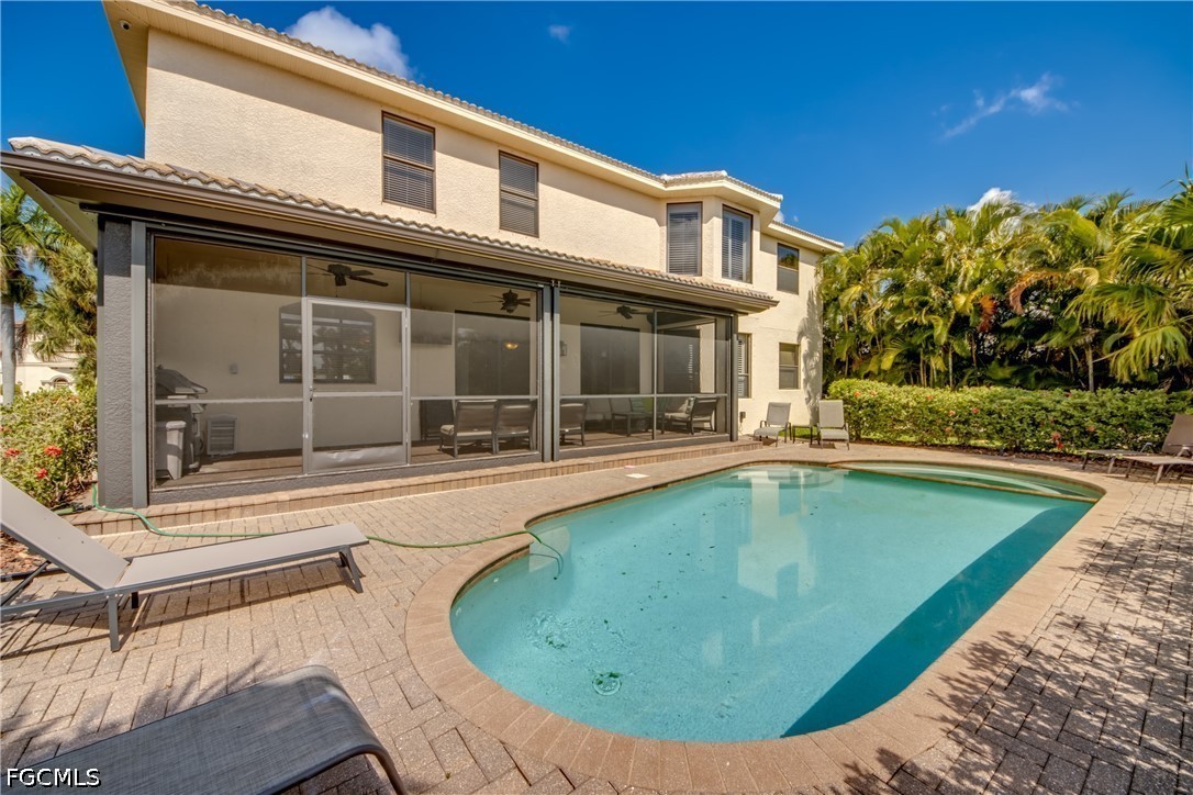 5601 Del Rio Court Cape Coral, FL 33904 - Photo 44 of 50 a view of a house with swimming pool