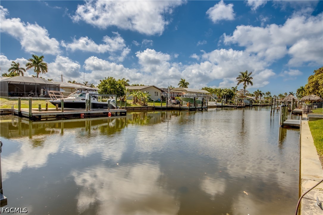 5601 Del Rio Court Cape Coral, FL 33904 - Photo 49 of 50 a view of a lake with boats in the background